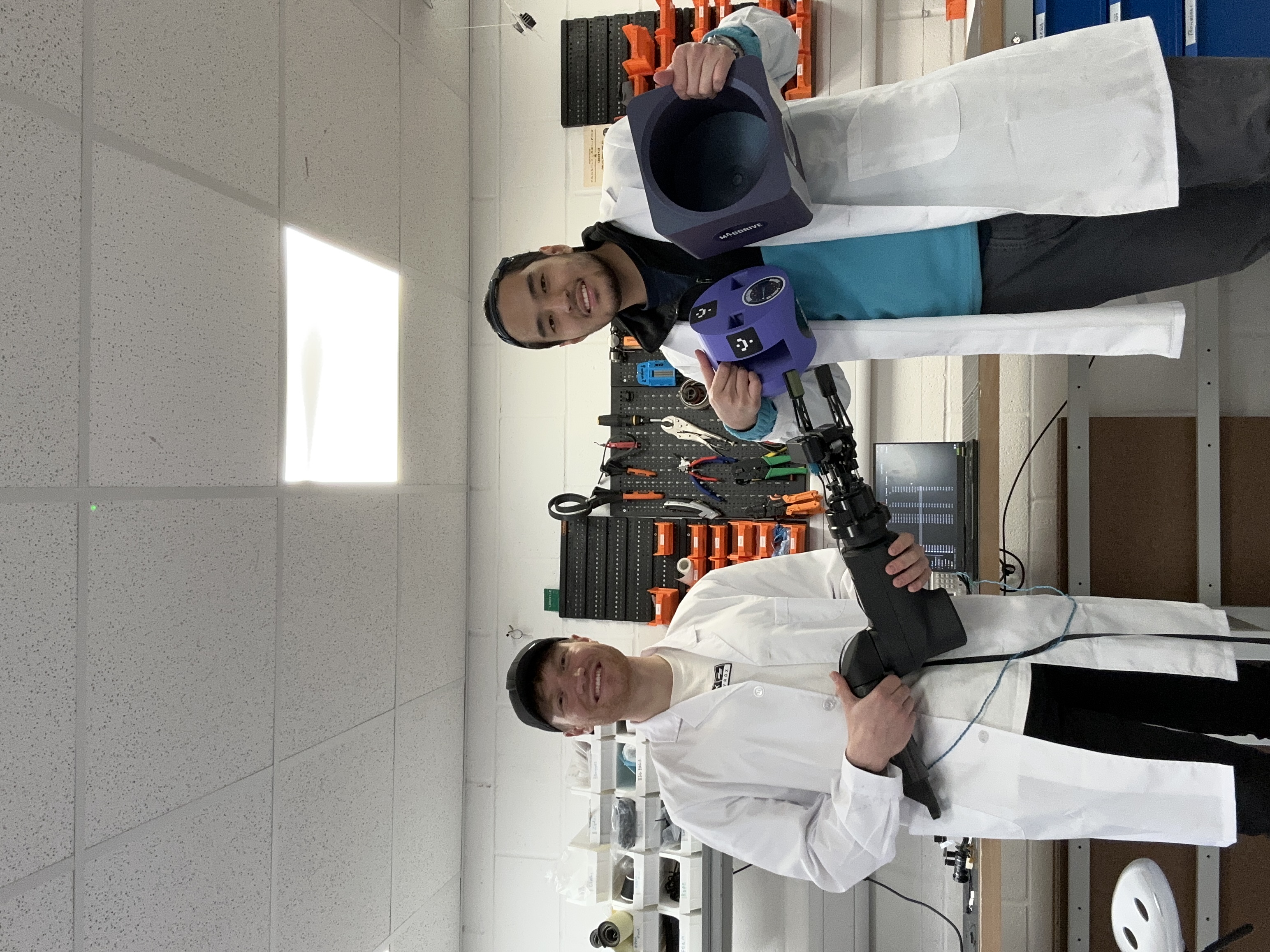 Agzam Mussayev and Thomas Santini pictured with the refuelling project hardware in the laboratory.